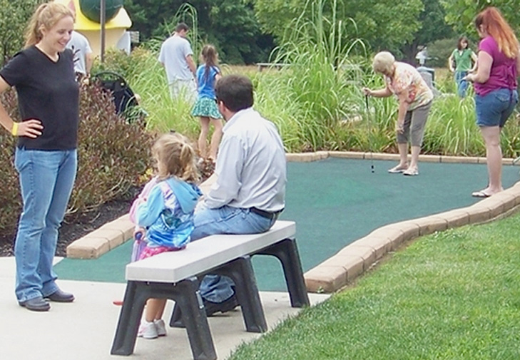 People Playing Miniature Golf